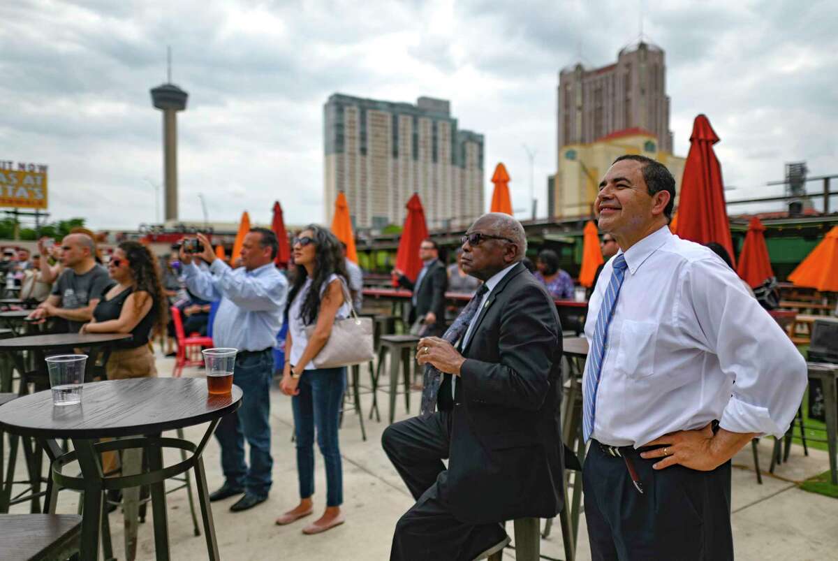 U.S. Rep. Henry Cuellar, D-Laredo, right, and House Majority Whip Jim Clyburn listen during a rally on Wednesday, May 4, 2022, at the Smoke BBQ+SKYBAR in San Antonio. Cuellar is defending his longtime South Texas congressional seat against progressive challenger Jessica Cisneros. Cuellar is facing renewed scrutiny from fellow Democrats over his anti-abortion stance following news that the U.S. Supreme Court appears poised to overturn Roe v. Wade.