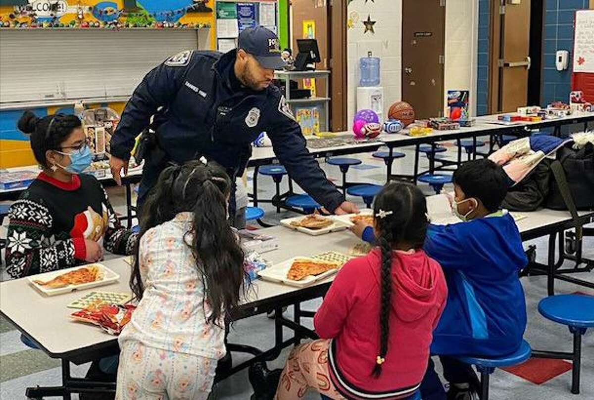 The kickoff celebration for the launch of the Middletown Police Activity League, which aims to provide positive experiences for youth and foster their interests to keep them engaged, is Saturday from noon to 4 p.m. at Macdonough Elementary School on Spring Street. Here, Police Officer Jeremy Tavares, who went through the Waterbury PAL program, works with young people.
