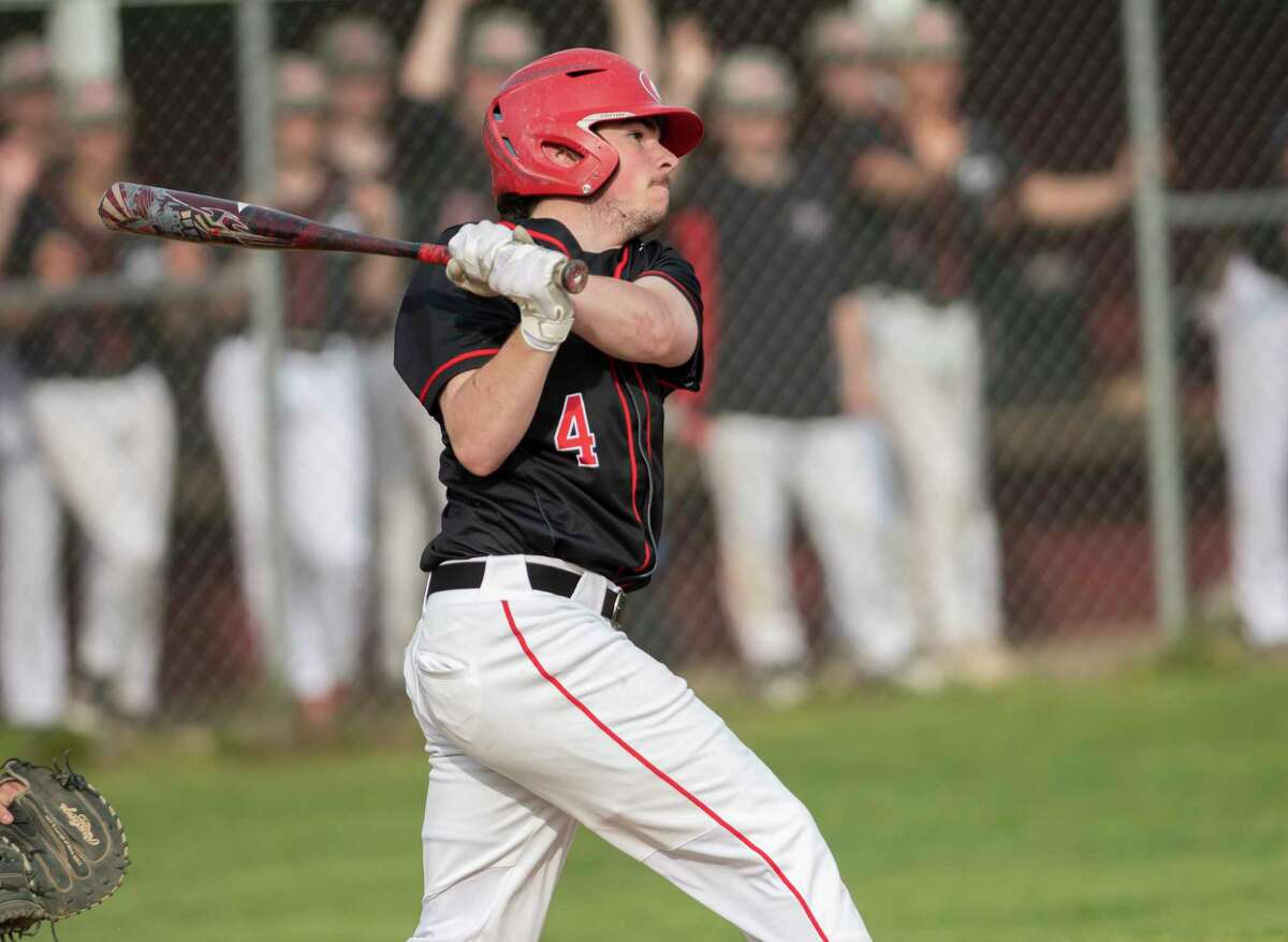 Guilderland’s Nick Mahar hits a two-run double during a baseball game against Burnt Hills-Ballston Lake on Thursday, May 5, 2022 in Burnt Hills, N.Y.