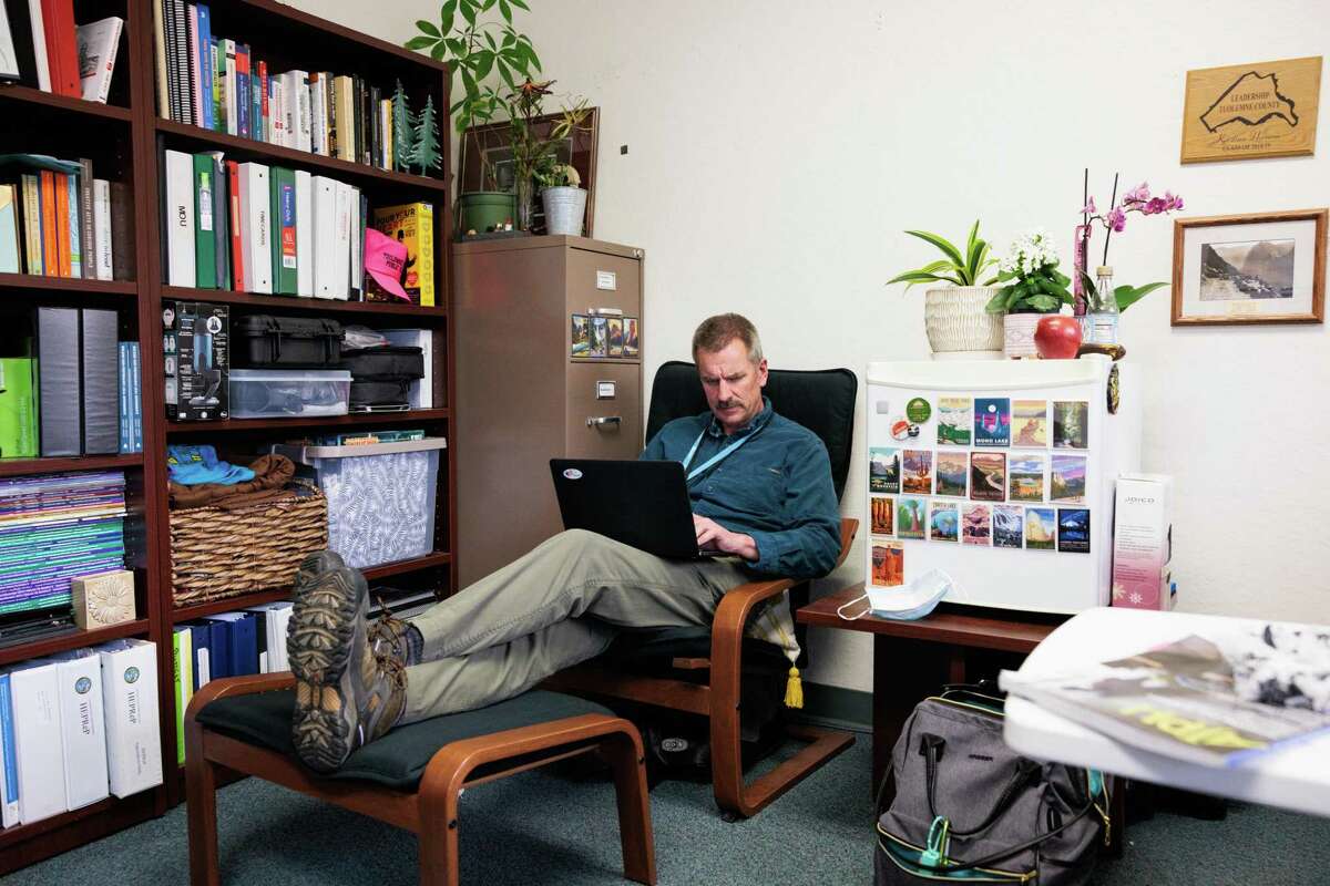 County Health Officer Dr. Eric Sergienko in his makeshift workspace at the Tuolumne Public Health Department in Sonora. Sergienko serves as the public health office for both Mariposa County and Tuolumne County.