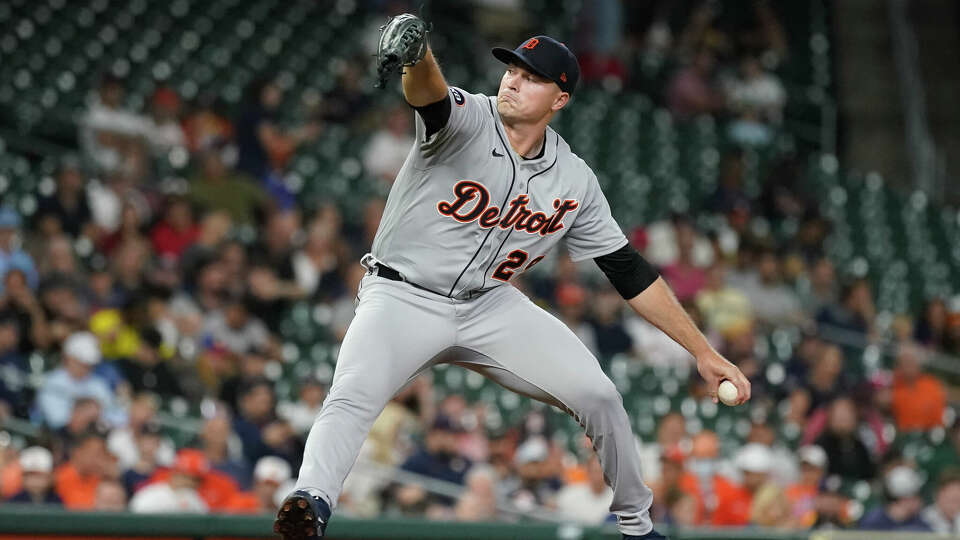 Detroit Tigers starting pitcher Tarik Skubal (29) pitches to Houston Astros designated hitter Michael Brantley (23) during the first inning of an MLB baseball game at Minute Maid Park on Thursday, May 5, 2022 in Houston.