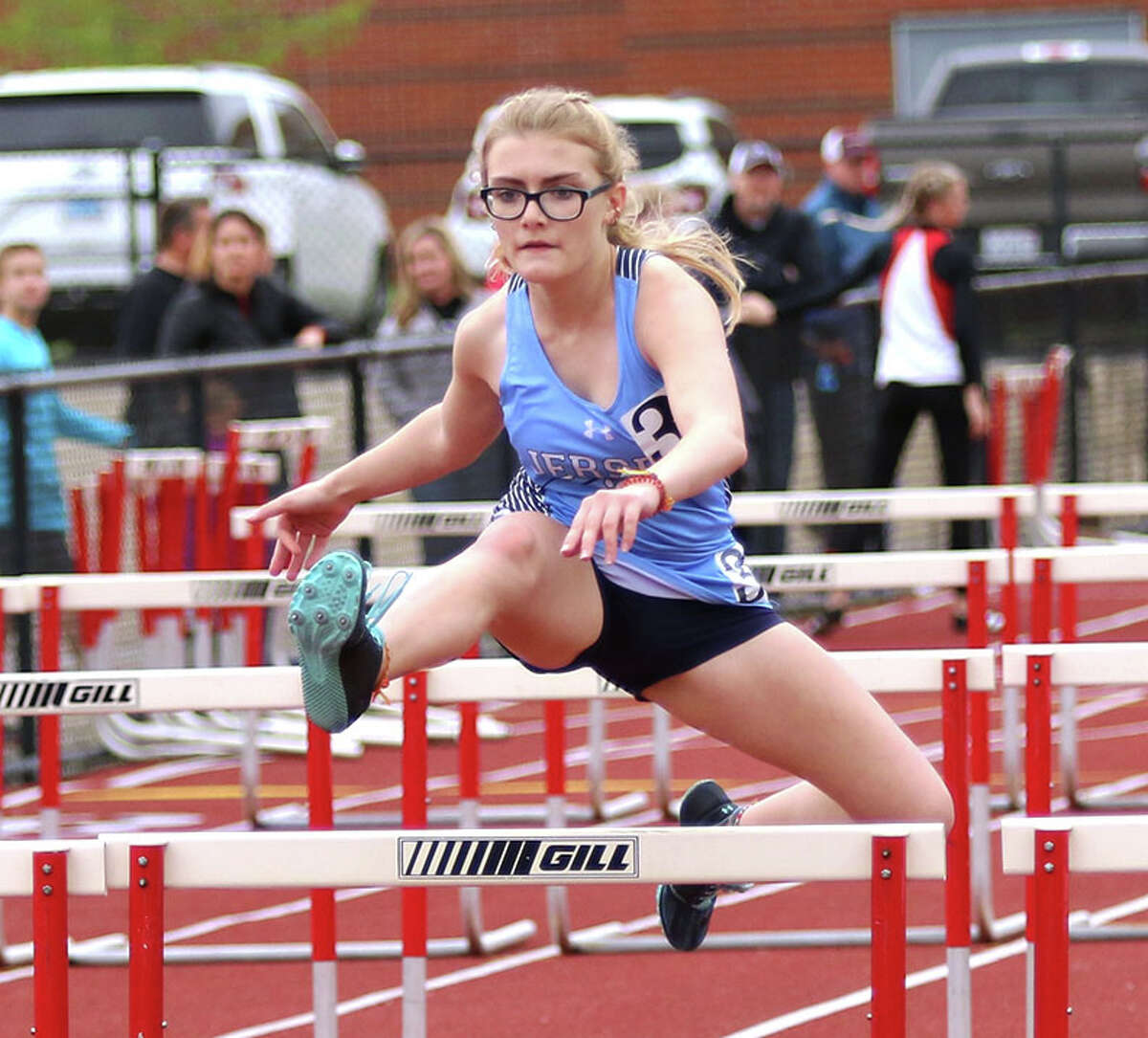 Jersey freshman Coree Yates clears a hurdle in a 100-meter hurdles heat  Thursday at the MVC girls track meet at Waterloo.
