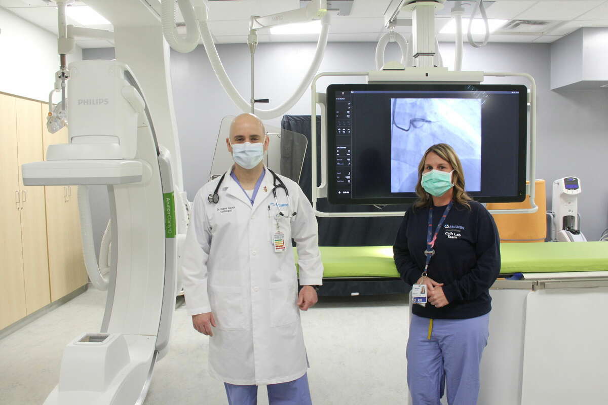 Cardiologist Gassan Alaouie and cath lab supervisor Jenny Barnes with new equipment part of McLaren Thumb Region's new Heart and Vascular lab. It allows for imaging equipment to detect any issues with a person's heart.  