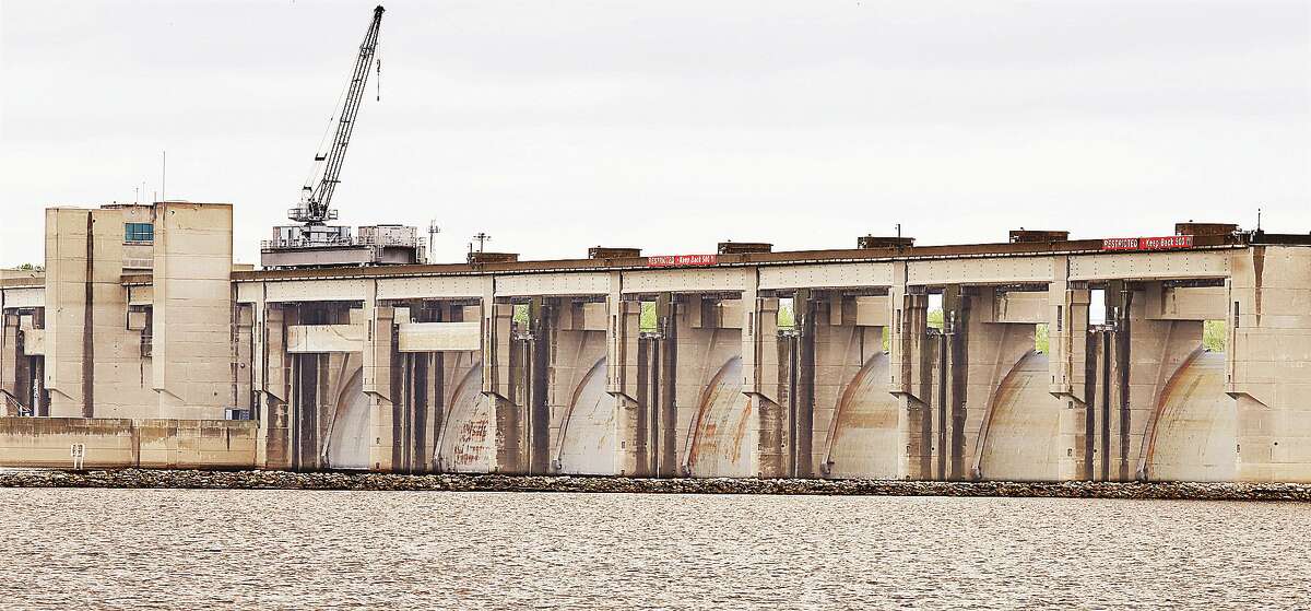 John Badman|The Telegraph The Tainter gates at the Melvin Price Locks and Dam 26 in Alton were completely raised Friday to allow minor floodlevel waters to flow freely downstream.