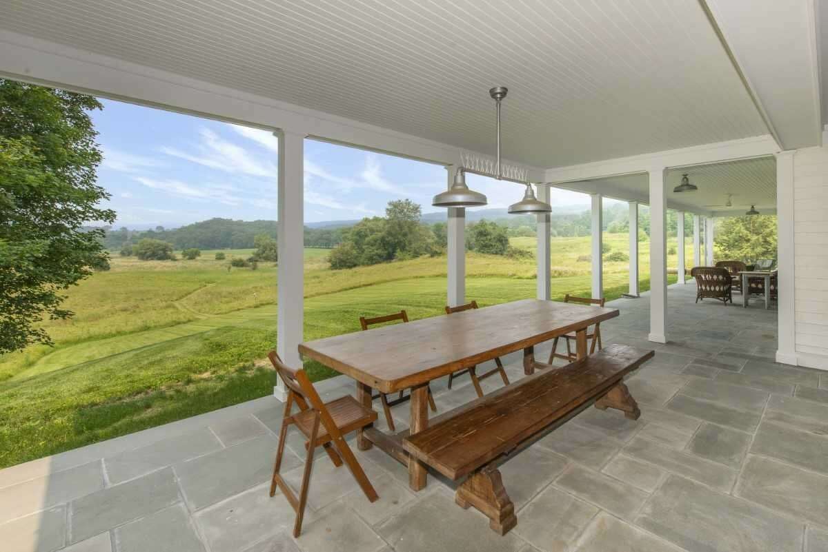 The patio boasts country views of the Shekomeko Valley in Dutchess County.