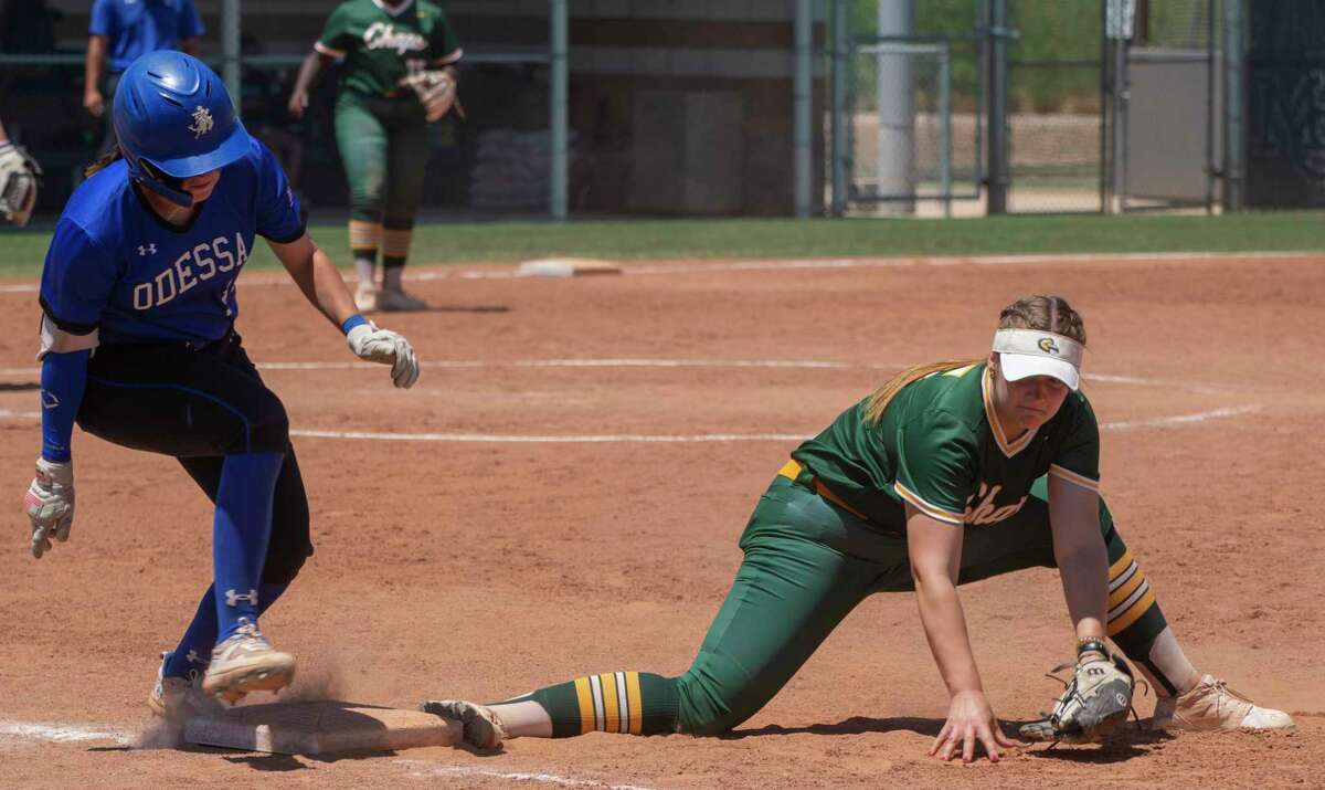 Odessa College's Madi Scott safely makes it to first on a hit as Midland College's Emily Maddux cannot hold on to the throw 05/06/2022 at Midland College softball field. Tim Fischer/Reporter-Telegram