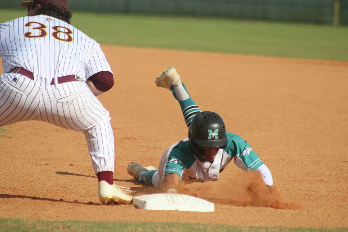 Deer Park first baseman C.J. Salinas waits for the pickoff throw as a Memorial Maverick dives back to the bag. The two squads are putting their respective seasons on the line this weekend in bi-district action.