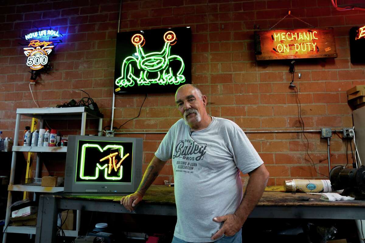 Ray Lynch, owner of Affordable Neon on the near East Side, has been bending glass to make neon signs since 1993.