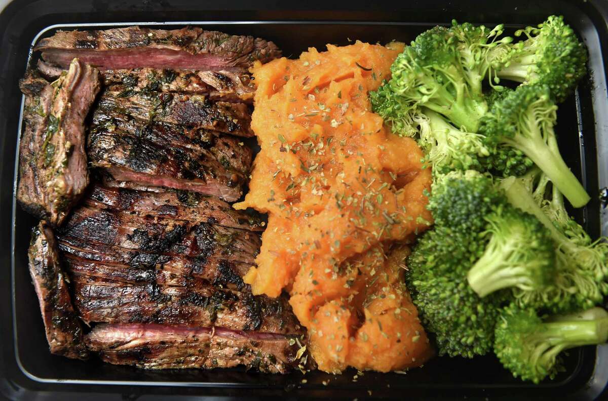 An order of sliced chimichurri steak, mashed sweet potatoes and lightly steamed broccoli made by Amanda Cesare at Amanda’s Healthy Cooking in Guilford on May 6, 2022.
