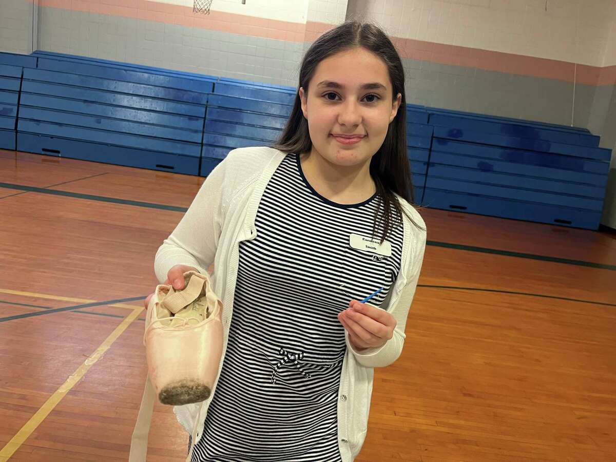 All Saints Catholic School eighth grader Caralena Smith created a technique to unlace ballet pointe shoes more efficiently for her capstone project.