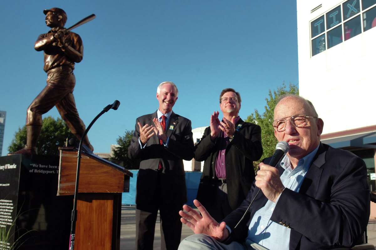 Fay Vincent, former commissioner of Major League Baseball, speaks at the 2010 dedication ceremony of James O’Rourke’s statue in front of the Ballpark at Harbor Yard, in Bridgeport, Conn., Friday. O'Rourke (1850-1919), a Bridgeport native, was inducted into the National Baseball Hall of Fame in 1945. Behind Vincent is former Bridgeport Mayor Bill Finch, and keynote speaker Michael Bielawa.