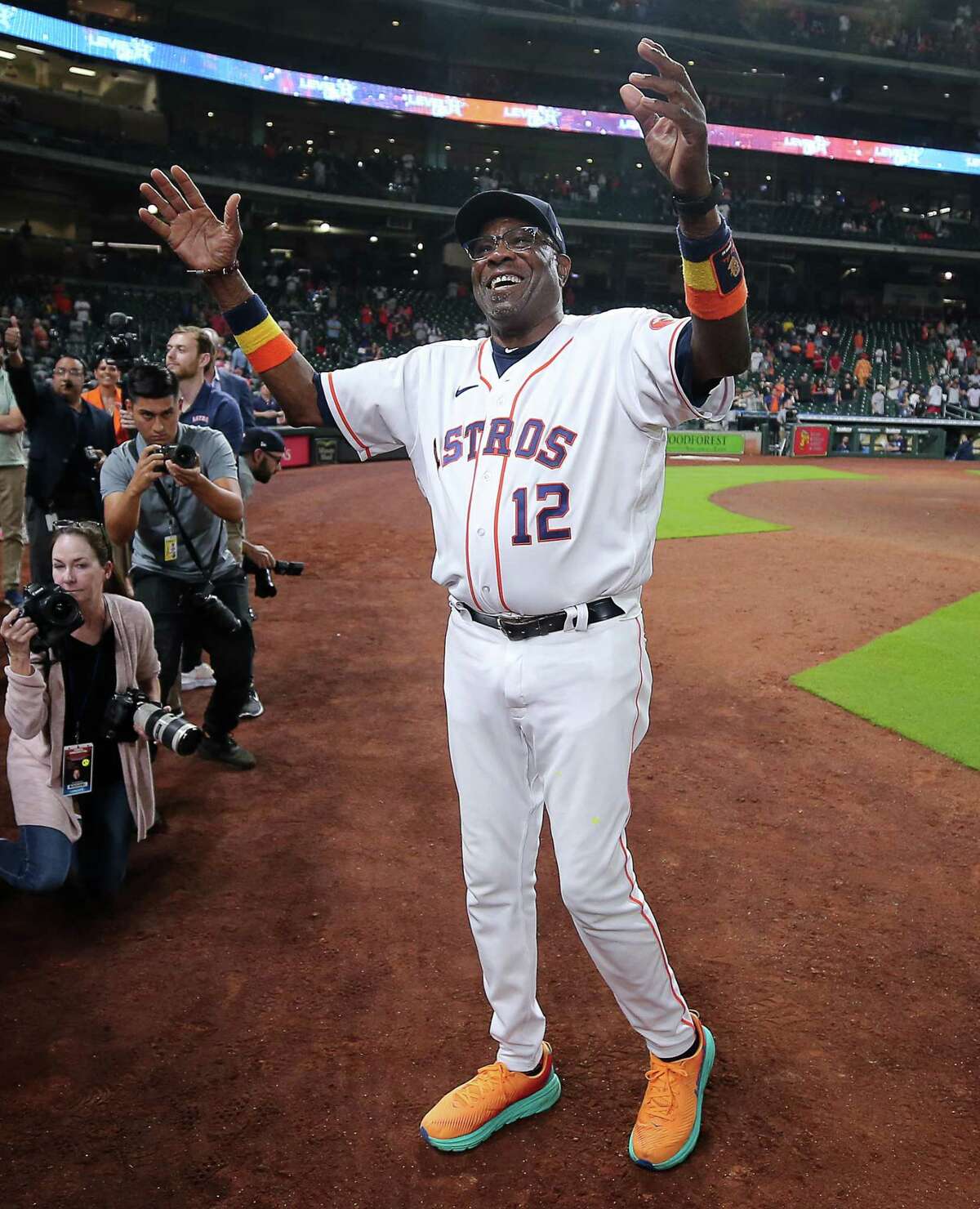 HOUSTON, TEXAS - MAY 03: Manager Dusty Baker Jr. #12 of the Houston Astros celebrates his 2000th career win after a game against Seattle Mariners at Minute Maid Park on May 03, 2022 in Houston, Texas. (Photo by Bob Levey/Getty Images)