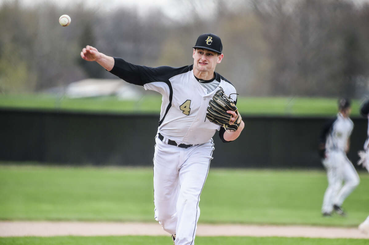 Bullock Creek's Carter Campau throws out a pitch during a game against Ithaca Friday, May 6, 2022 at Bullock Creek High School.