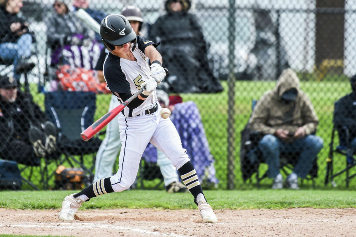 Bullock Creek's J.J. Nelson swings on a pitch during a game against Ithaca Friday, May 6, 2022 at Bullock Creek High School.