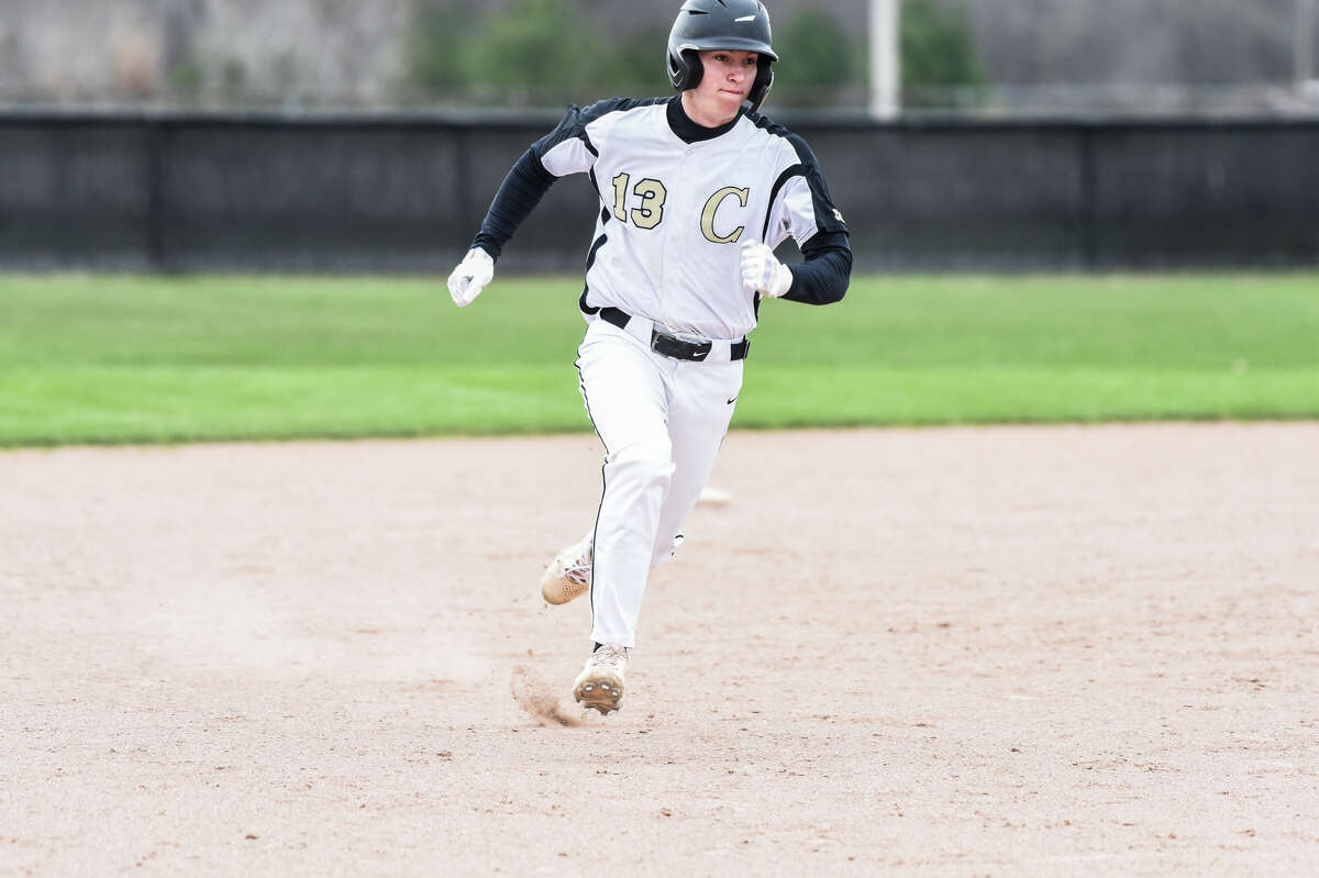 Bullock Creek's Parker Grzegorczyk runs from second to third base during a game against Ithaca Friday, May 6, 2022 at Bullock Creek High School.