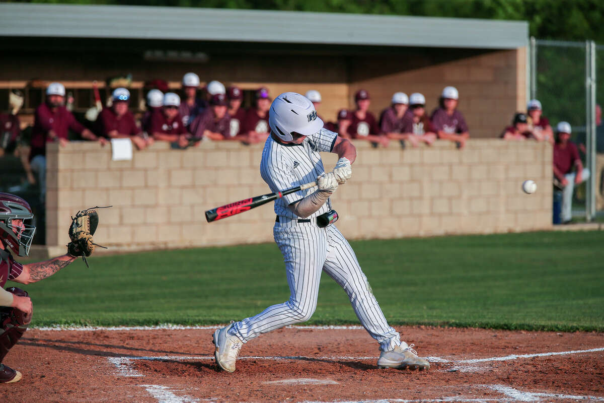 Hardin Jefferson left fielder takes a swing in a playoff game against the Silsbee Tigers. Photo taken by Jarrod Brown on May 6, 2022 in Sour Lake , TX