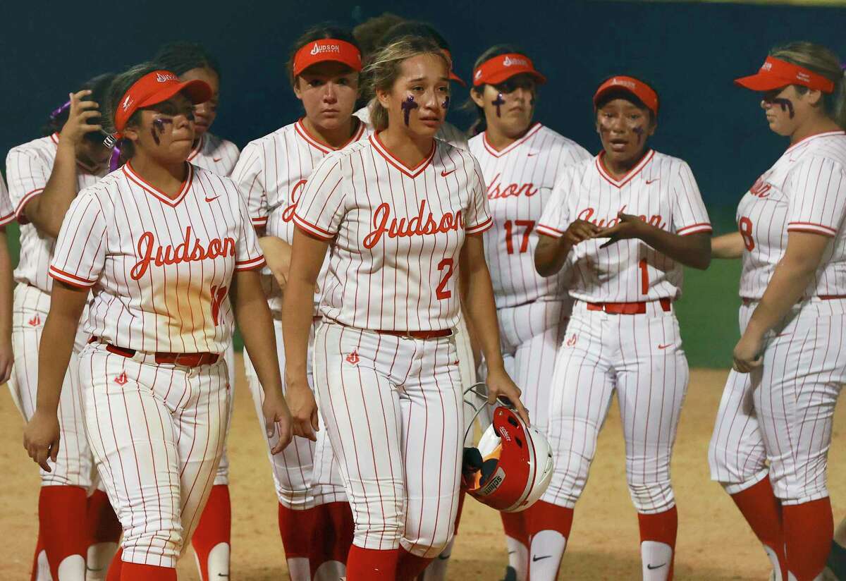 Judson softball players react to their loss to Austin Bowie in the second-round 6A second-round softball playoff game at Clemens High School on Friday, May 6, 2022. Judson lost to Bowie, 2-4, to conclude their playoff run.