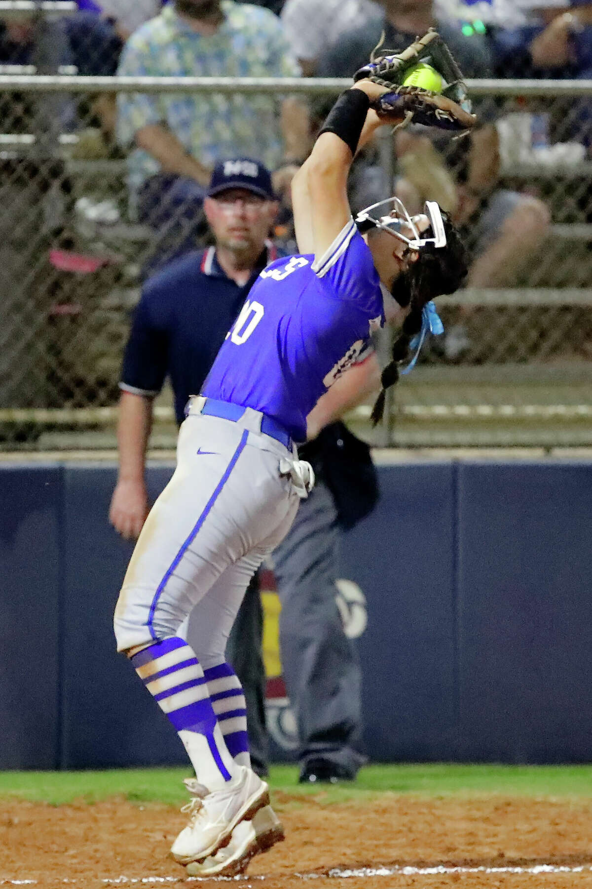 Barbers Hill third base player KateLynn Cooper makes the infield foul line catch for the out against Foster during their Region III-5A softball playoff game Friday, May 6, 2022 at Dawson High School in Pearland, TX.
