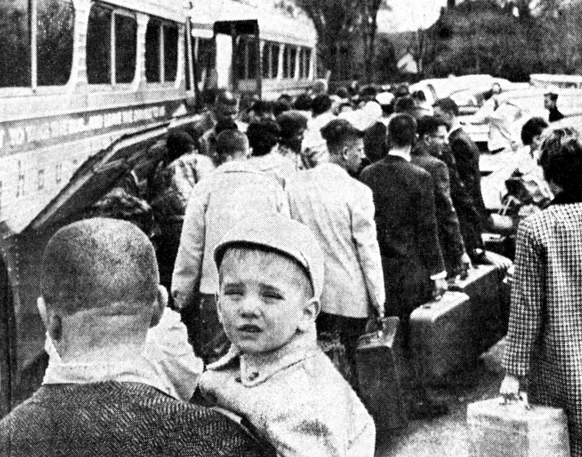 Todd Jach is shown with his father on Monday afternoon seeing his sister off to New York as 65 Manistee High School seniors left on an educational tour. The traveling seniors plan to visit New York and Washington, D.C., then return home Saturday noon. The photo was published in the News Advocate on May 8, 1962.