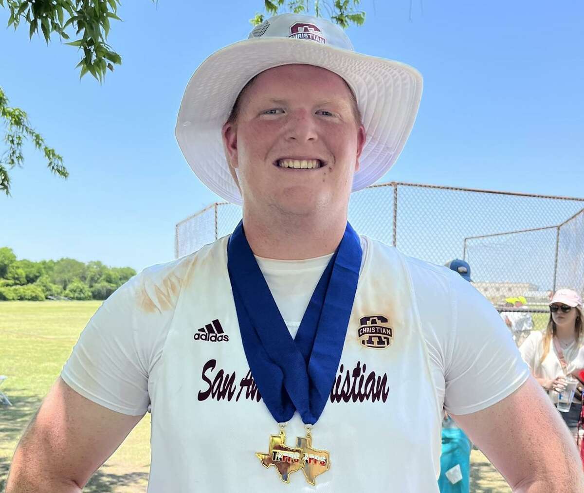 San Antonio Christian senior Ethan Sanders poses with gold medals for winning the TAPPS Class 6A state championships in the shot put and discus on Friday, May, 6, 2022 at Waco Midway High School. He set meet records in both events.