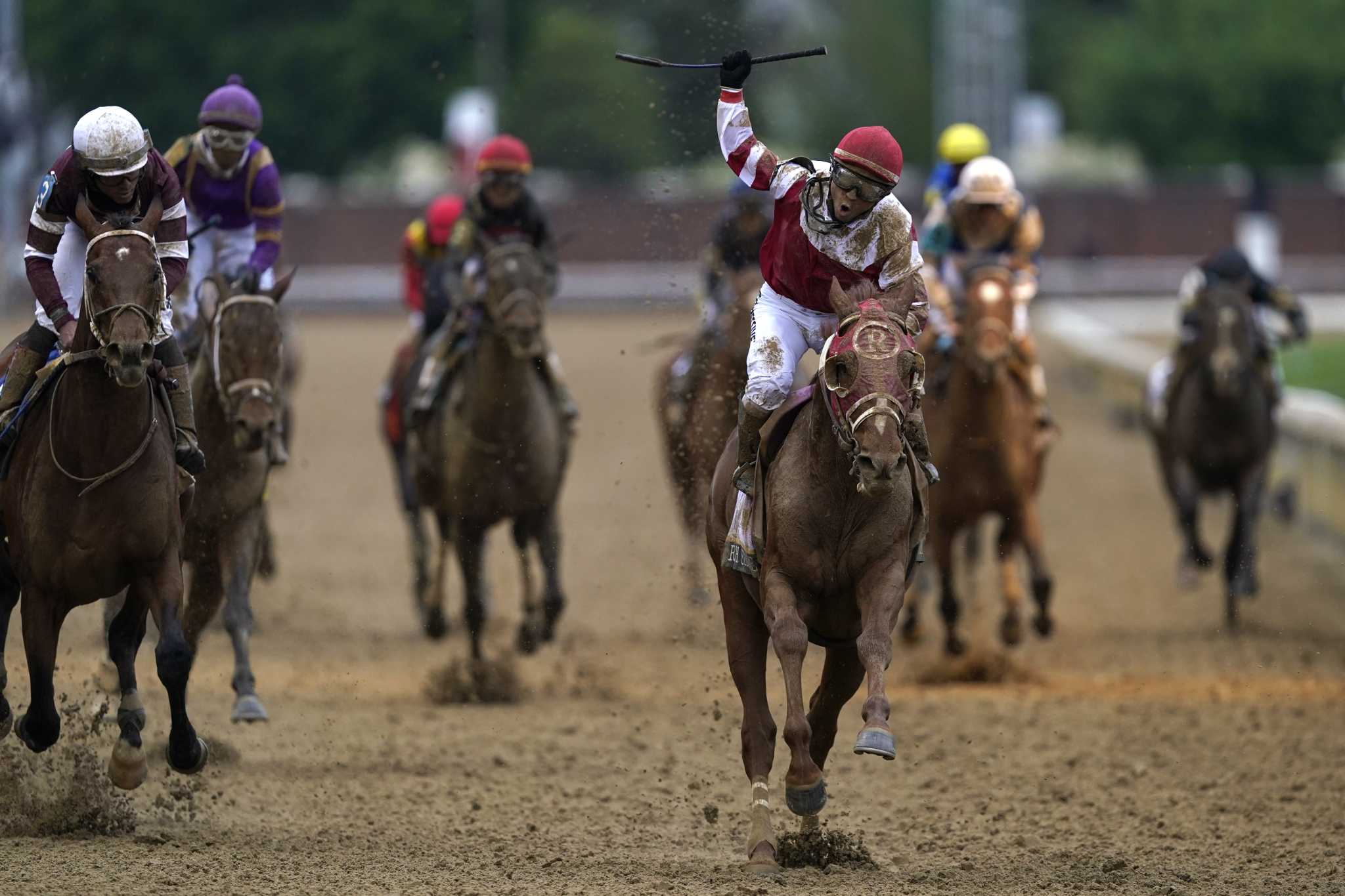 80-1 shot Rich Strike races to huge upset in Kentucky Derby.
