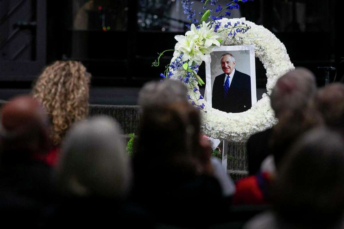A wreath bearing a photo of the diplomat and former U.S. Sen. Bob Krueger is displayed at his memorial service at Oakwood Church in New Braunfels on Thursday.