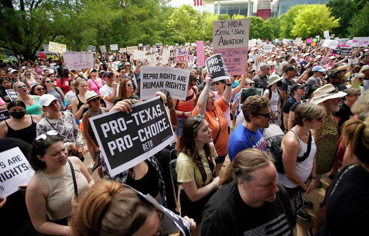 The crowd cheers during an abortion rights rally organized by Beto O’Rourke at Discovery Green on Saturday, May 7, 2022 in Houston.