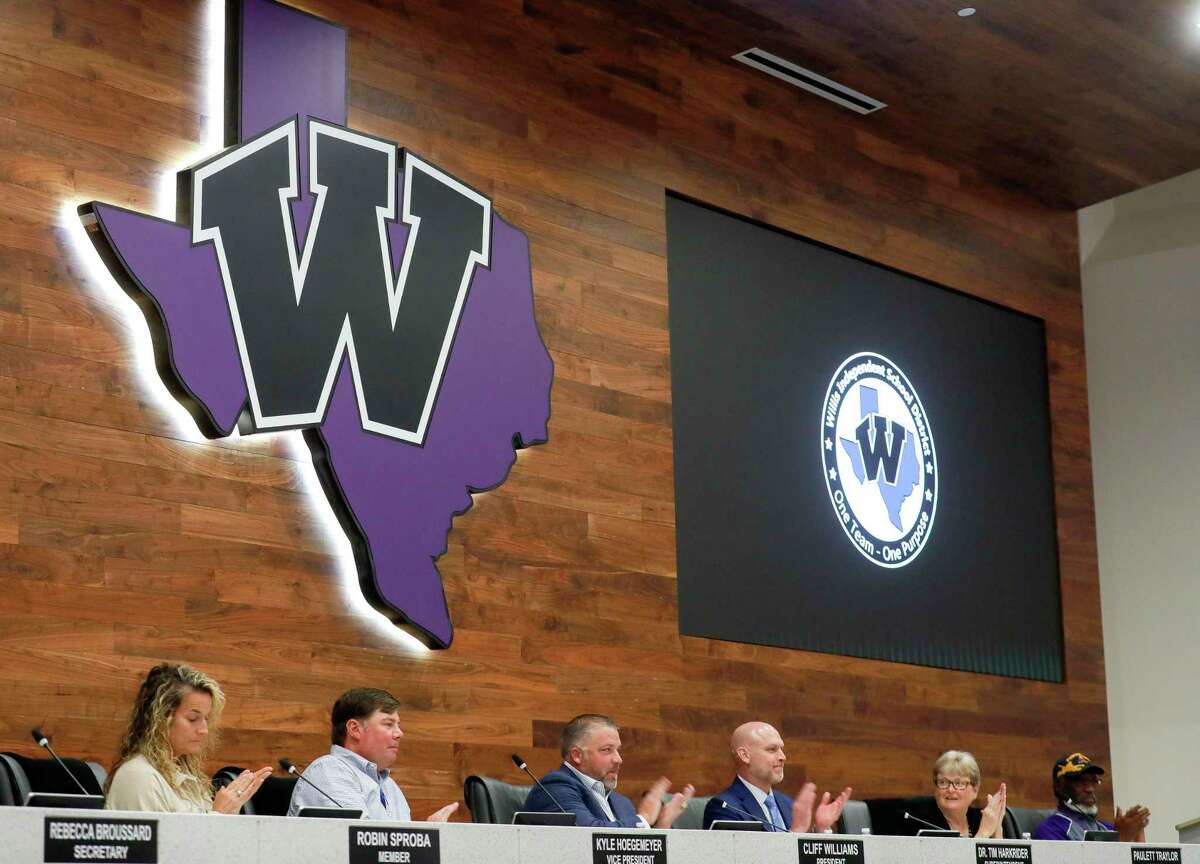 listen to a presentation by the Willis ISD bond committee during a Willis ISD board meeting, Wednesday, Feb. 10, 2022, in Willis.