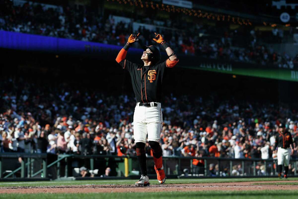 SAN FRANCISCO, CALIFORNIA - MAY 07: Mauricio Dubon #1 of the San Francisco Giants celebrates after hitting a two-run home run in the bottom of the second inning against the St. Louis Cardinals at Oracle Park on May 07, 2022 in San Francisco, California. (Photo by Lachlan Cunningham/Getty Images)