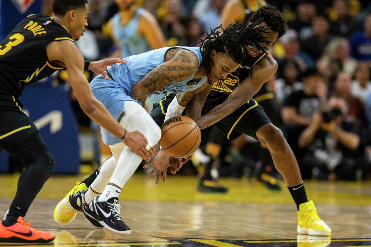 Warriors’ Jordan Poole under scrutiny for Ja Morant's injury. Memphis Grizzlies' guard Ja Morant dribbles the ball as he is defended by Golden State Warriors’ guard Jordan Poole, left, and forward Andrew Wiggins during the fourth quarter in Game 3 of the 2022 NBA Playoffs Western Conference Semifinals at Chase Center in San Francisco, Calif. Saturday, May 7, 2022. The Warriors defeated the Grizzlies 142-112.