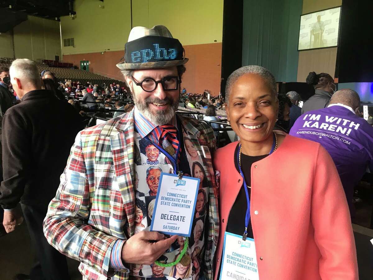 Rep. Stephanie Thomas of Norwalk with a Westport supporter, Harris Falk at the Democratic state nominating convention in Hartford Saturday. Falk’s hat featured a scrolling LED sign with Thomas’s name.