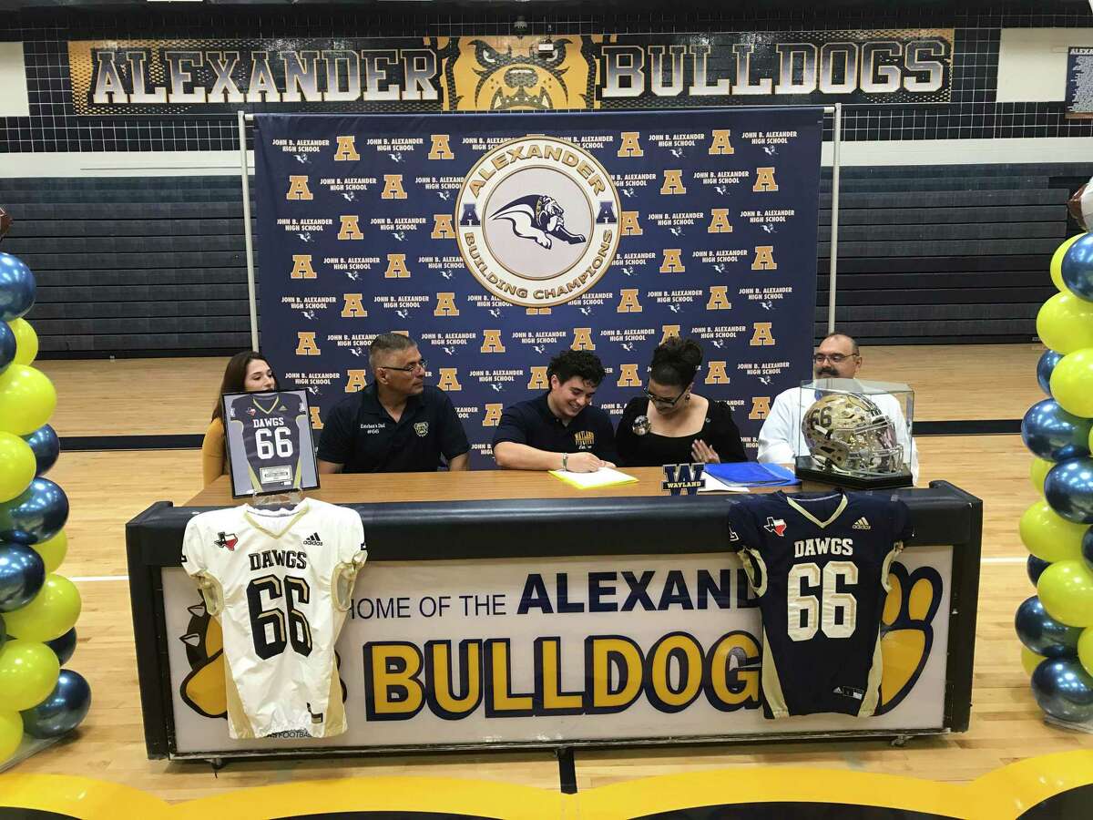 Alexander’s Esteban Caballero signed his national letter of intent to play football at Wayland Baptist University on Friday.