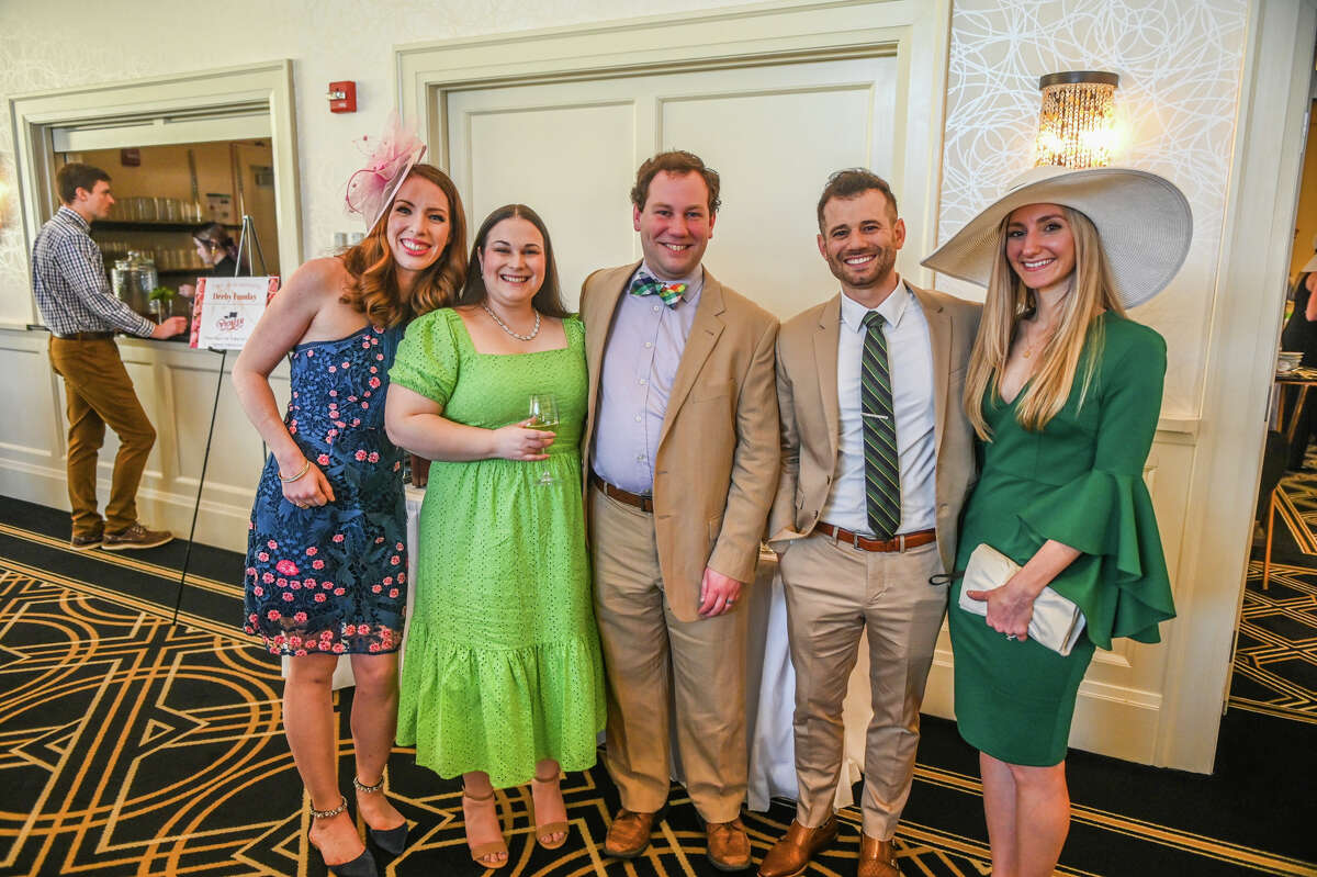 Katherine Boothroyd, Meredith Inks, Nathan Inks, Matt Preston and Francy Valente pose for a photo during the Arc of Midland's Derby Funday event Saturday, May 7, 2022 at the Midland Country Club.