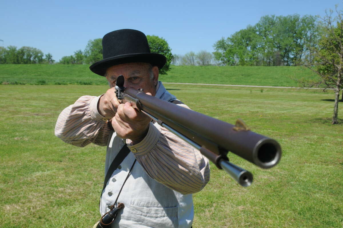 Ed Hamberg demonstrates period firearms during last weekend's Departure event at Lewis and Clark State Historic Site in Hartford.