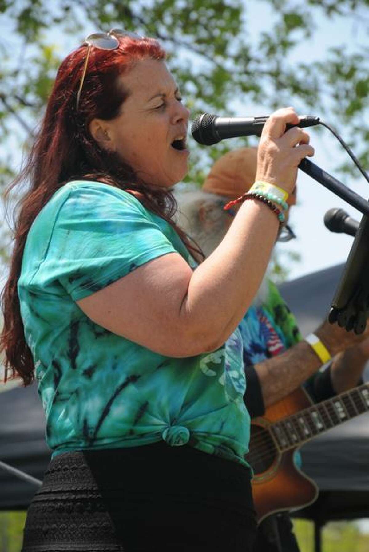 A singer belts out am Janis Joplin song during the Trinity River Festival in Cottage Hills on Saturday. More than 30 bands performed over two days for the fifth annual fundraiser begun in memory of 17-year-old Trinity Buel, who died in a 2018 auto accident. 