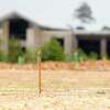 Stakes mark property lines in a new subdivision under construction, Tuesday, May 3, 2022, in Conroe. Conroe residents will get the opportunity to comment on two of the city’s hot button issues this week — trees and residential lot size.