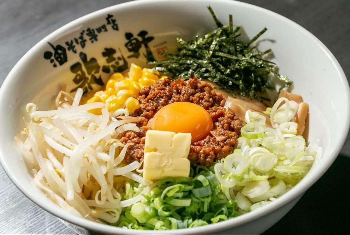Abura soba with spicy minced meat, egg yolk, butter and other toppings from Kajiken, which is opening its first U.S. restaurant in San Mateo.