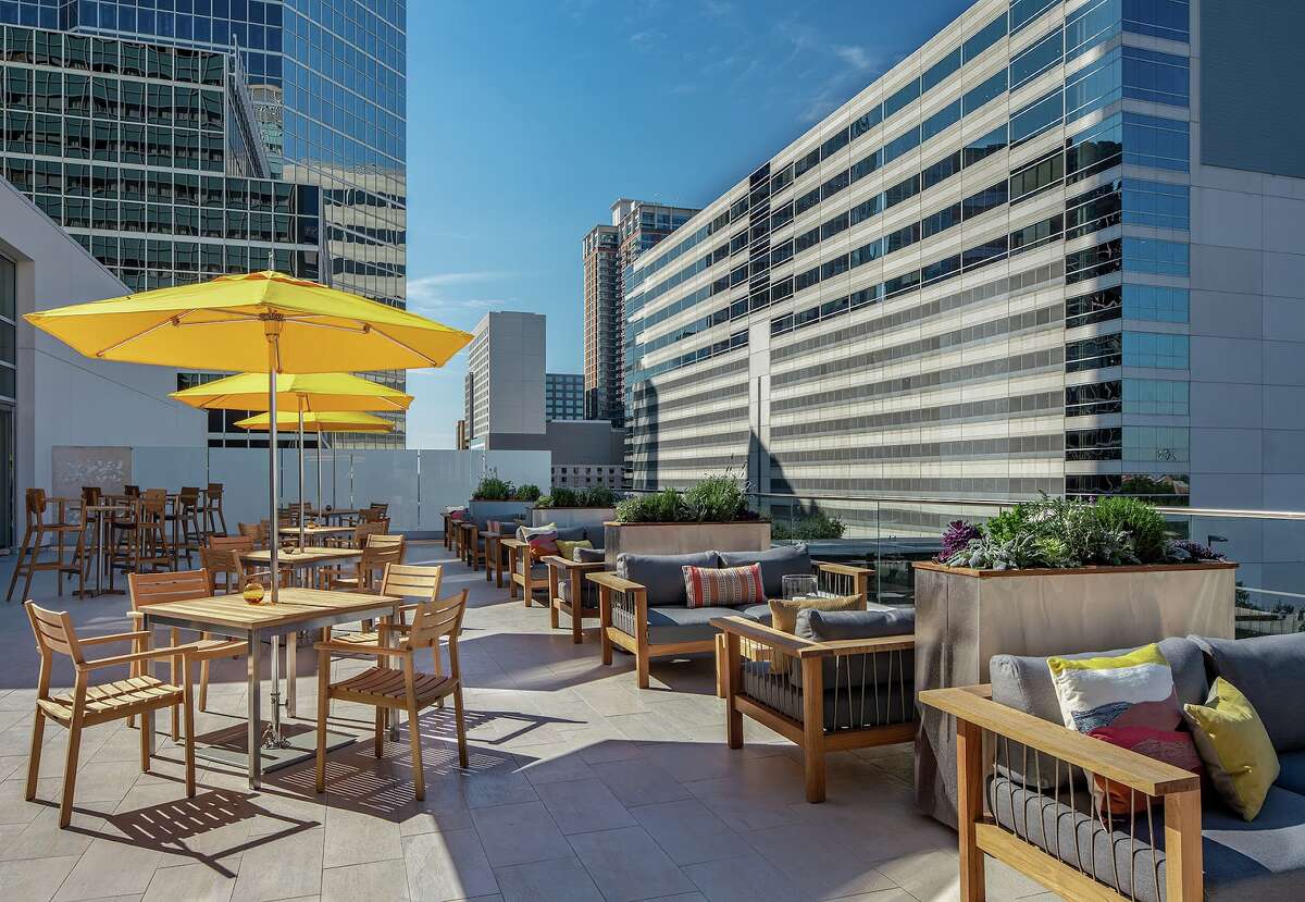 Terrace 54 Bar + Table overlooks surrounding Rice University and the Medical Center.