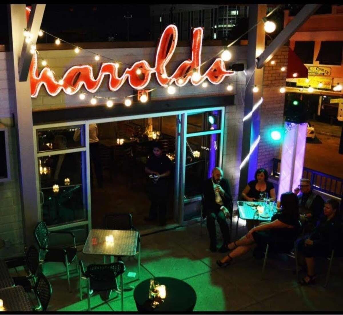 Harold's Restaurant, Bar & Rooftop Terrace at night.