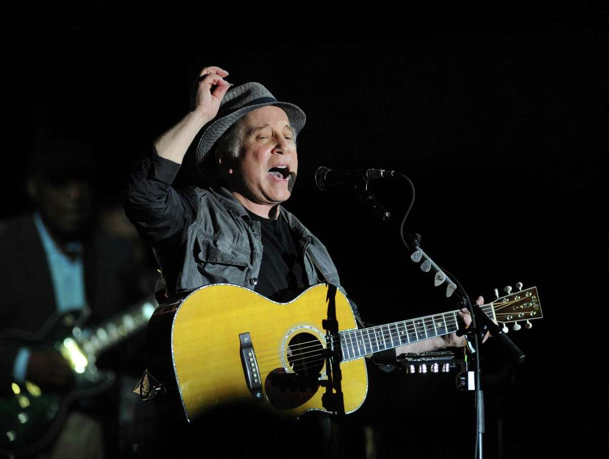 Paul Simon performs at the Greenwich Town Party at Roger Sherman Baldwin Park in 2012.