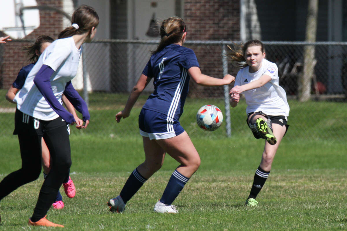 Midland Fusion's Kaitlin Sharp takes a shot on goal while playing in the 39th annual Midland Invitational Tournament Saturday, May 9, 2022 at the Midland Soccer Club.