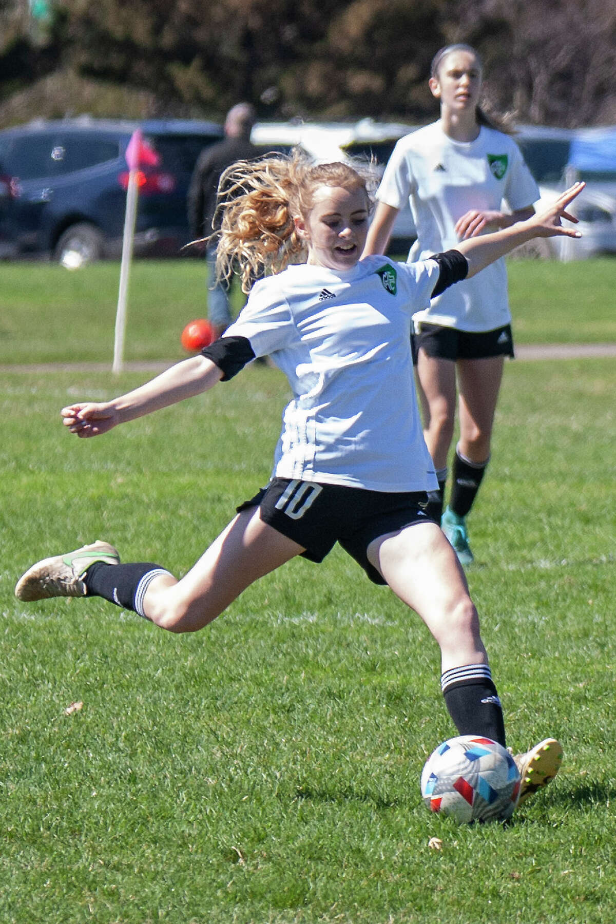 Midland Fusion's Lauren Polansky takes a shot while playing in the 39th annual Midland Invitational Tournament Saturday, May 9, 2022 at the Midland Soccer Club.