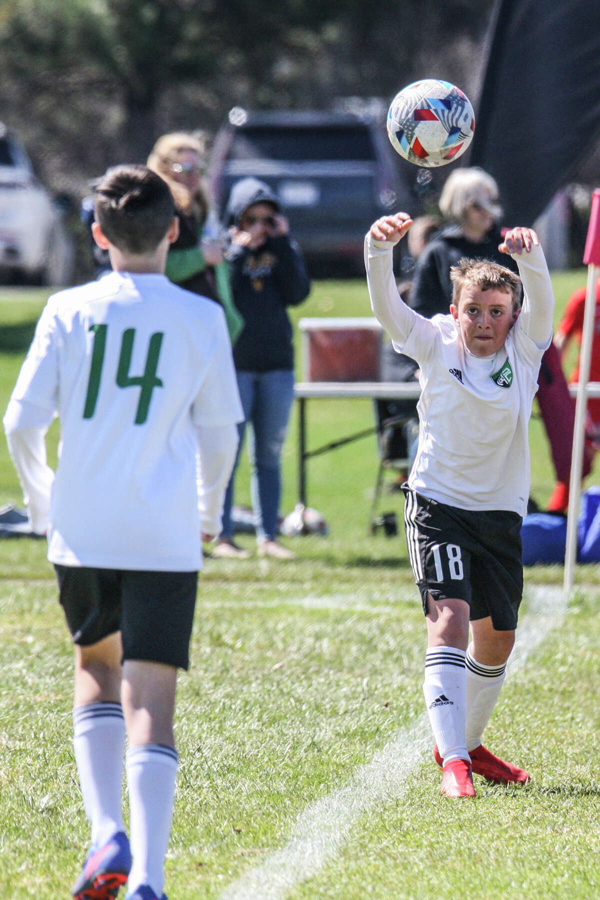 Midland Fusion's Travis Lloyd takes a throw-in while playing in the 39th annual Midland Invitational Tournament Saturday, May 9, 2022 at the Midland Soccer Club.