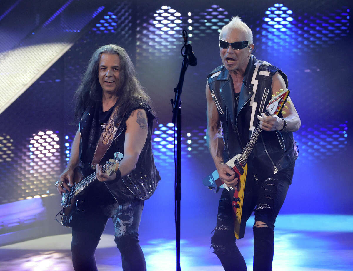 Bassist Pawel Maciwoda (L) and guitarist Rudolf Schenker of Scorpions perform on opening night of the band's nine-date residency, "Sin City Nights" at Zappos Theater at Planet Hollywood Resort & Casino on March 26, 2022 in Las Vegas, Nevada. 