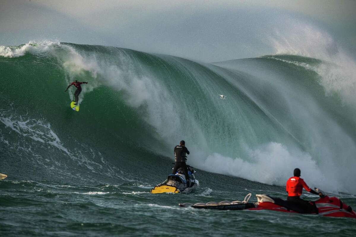 Australian surfer Jamie Mitchell takes off down a Mavericks wave.
