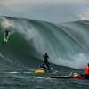 Australian surfer Jamie Mitchell takes off down a Mavericks wave.
