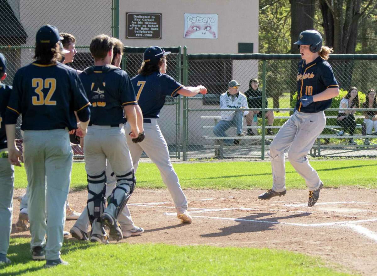 Averill Park’s Alex Yash, right, has come up with plenty of big hits in the postseason.
