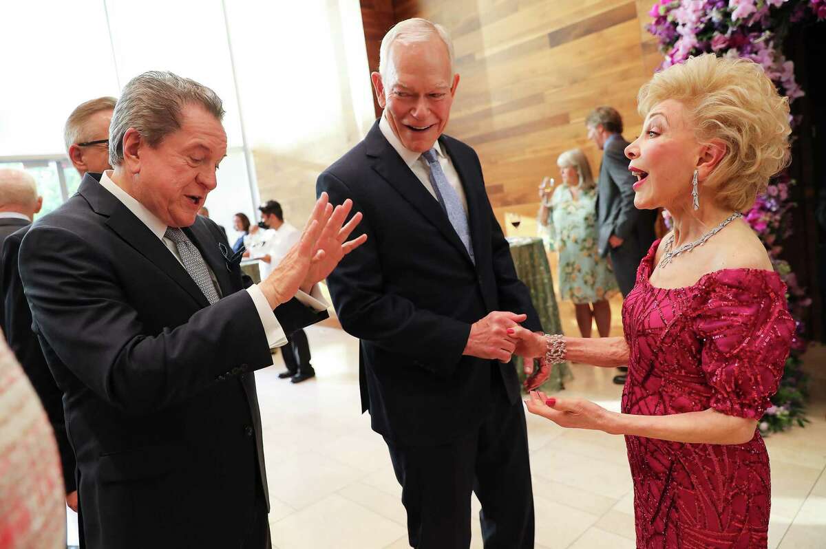 Margaret Alkek Williams chats with Bill Stubbs, left, and Jay Jones during an event in her honor at the Houston Ballet on Monday, May 9, 2022. Williams is donating $10 million to the ballet.