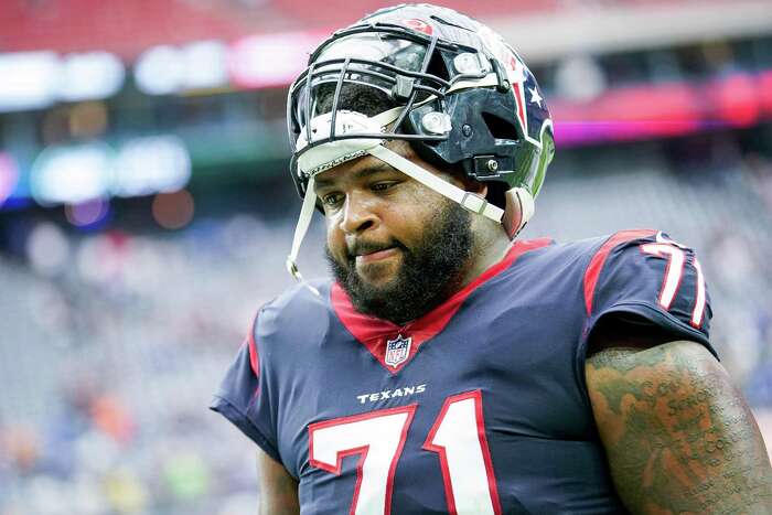 PHOTOS: Texans wear new Battle Red helmets during training camp