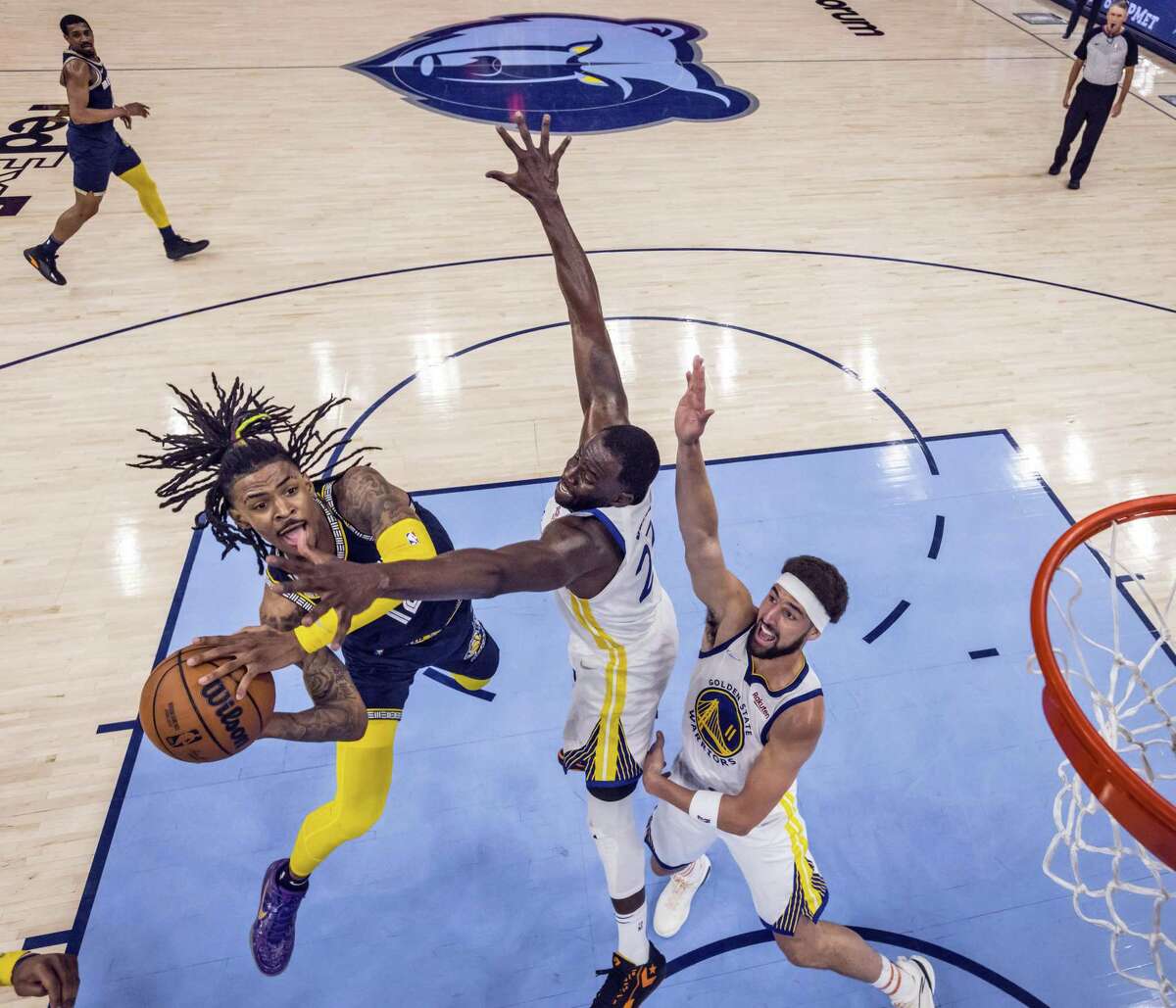 Grizzlies guard Ja Morant out with knee injury for Game 4